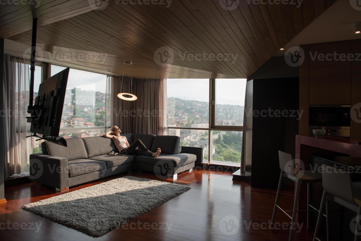 woman using tablet in beautiful apartment photo