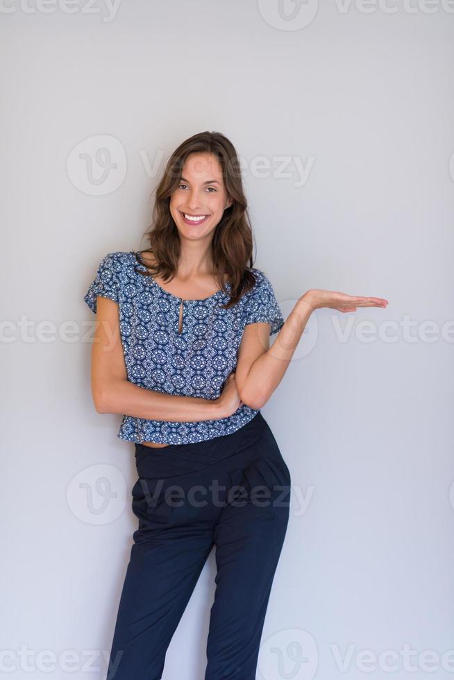young woman presenting your product photo