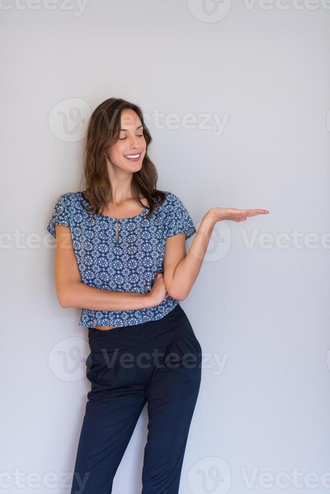 young woman presenting your product photo
