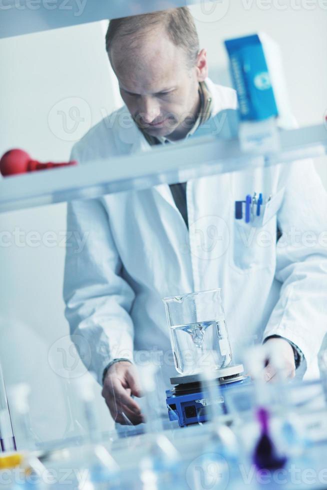 research and  science people  in labaratory photo