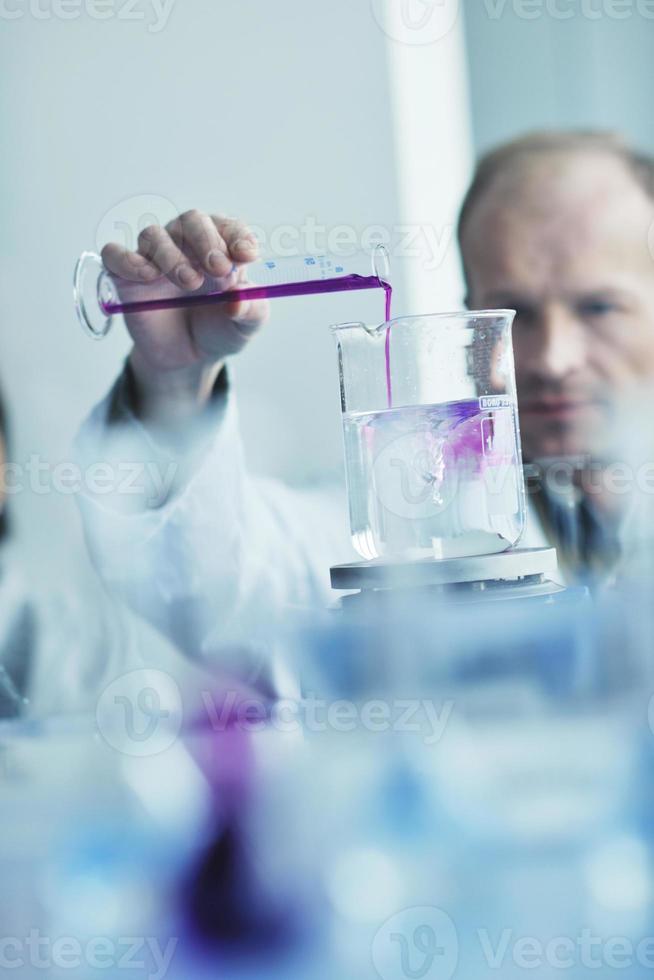 research and  science people  in labaratory photo