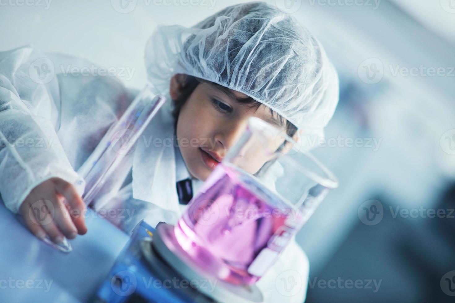 little child scientist in lab photo