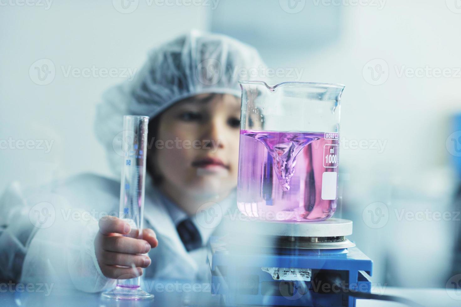 little child scientist in lab photo