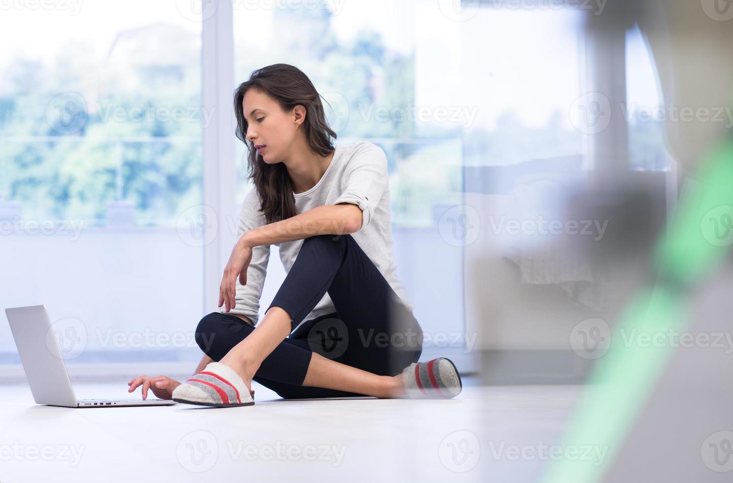 young women using laptop computer on the floor 10390173 Stock Photo at