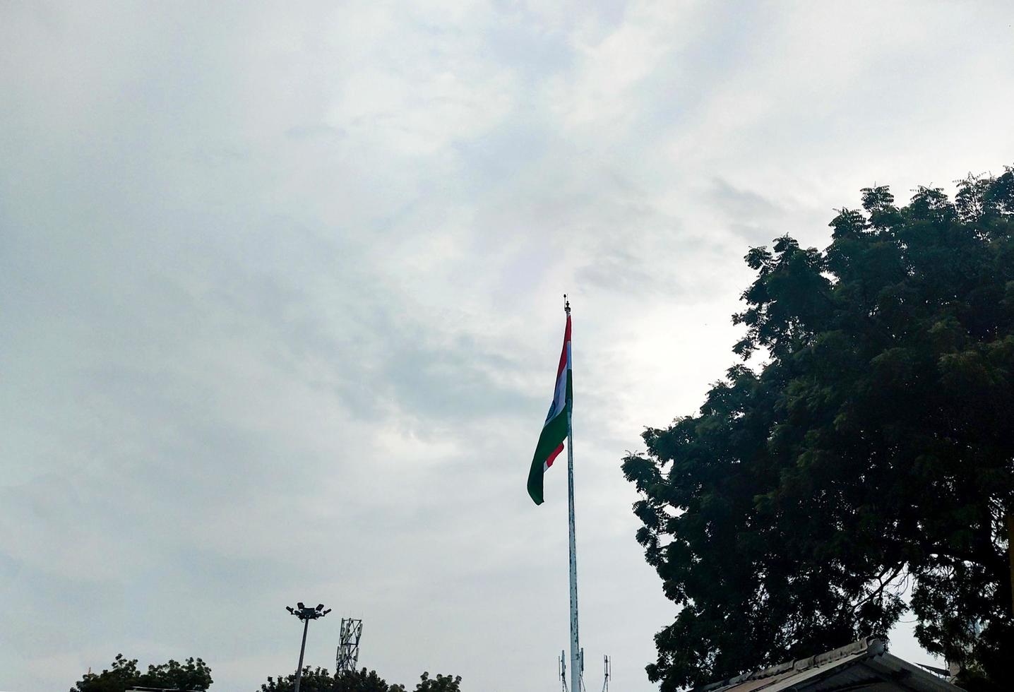 Waving Flag of India in Blue Sky photo