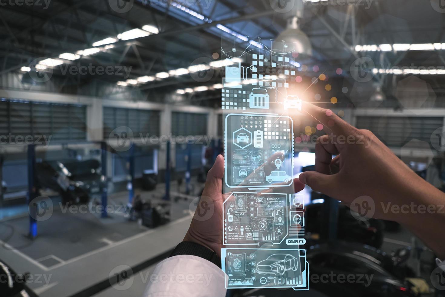 Robot Technology AI fix car repair on car Lift in garage dealership Fix the car with a touch touching UI screen interface point to the point that needs to corrected New technology in IOT car industry photo