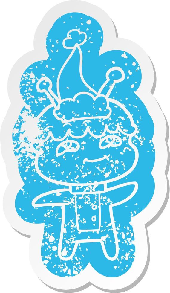 friendly cartoon distressed sticker of a spaceman wearing santa hat vector