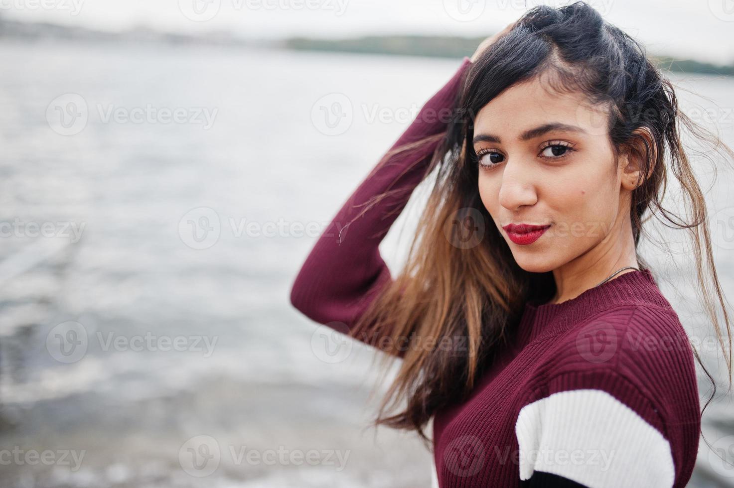 Close up portrait of young beautiful indian or south asian teenage girl in dress. photo