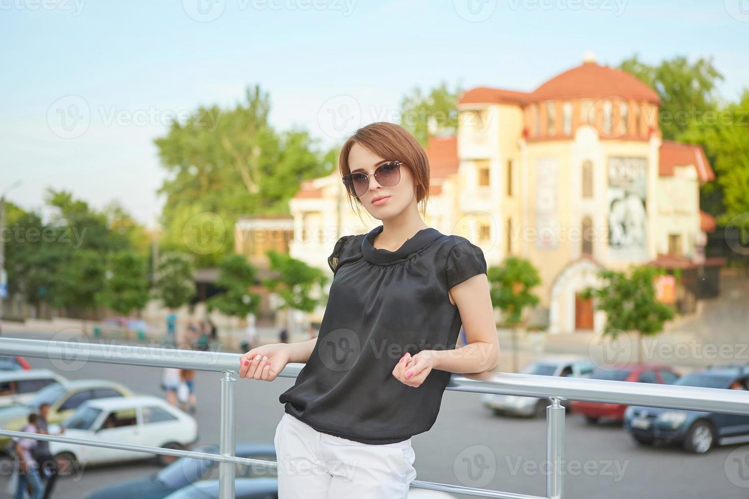 Beautiful young woman outdoors. photo
