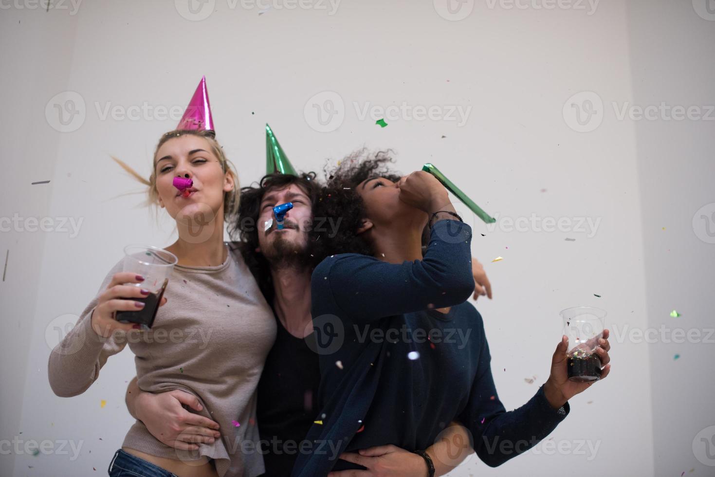 confetti party multiethnic group of people photo