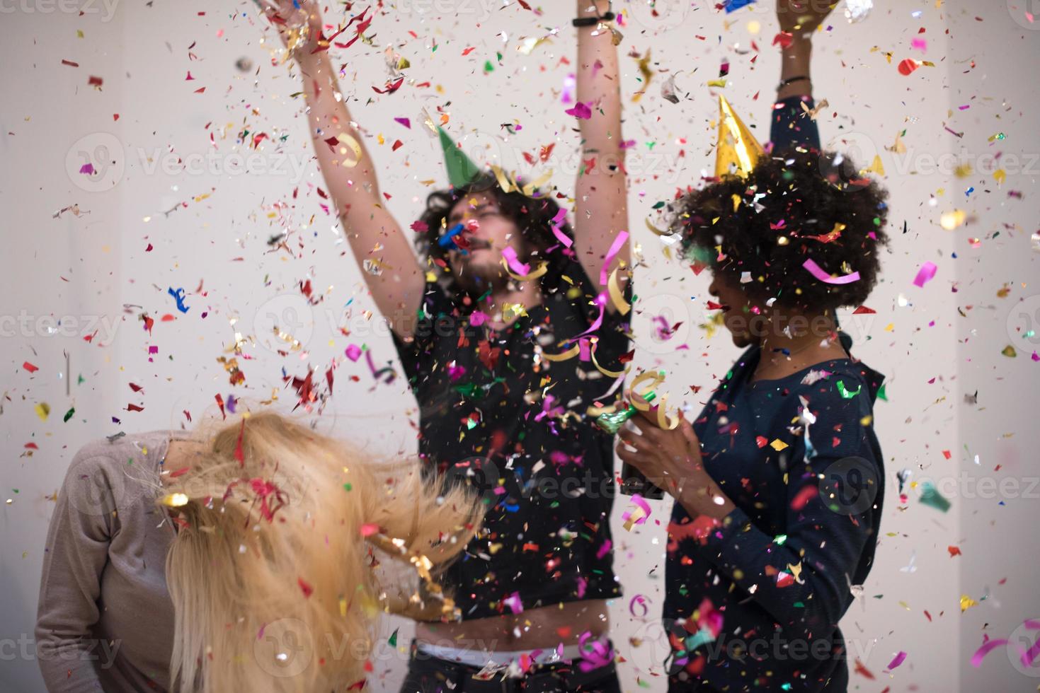 confetti party multiethnic group of people photo