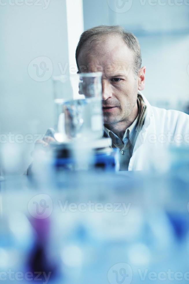 research and  science people  in laboratory photo