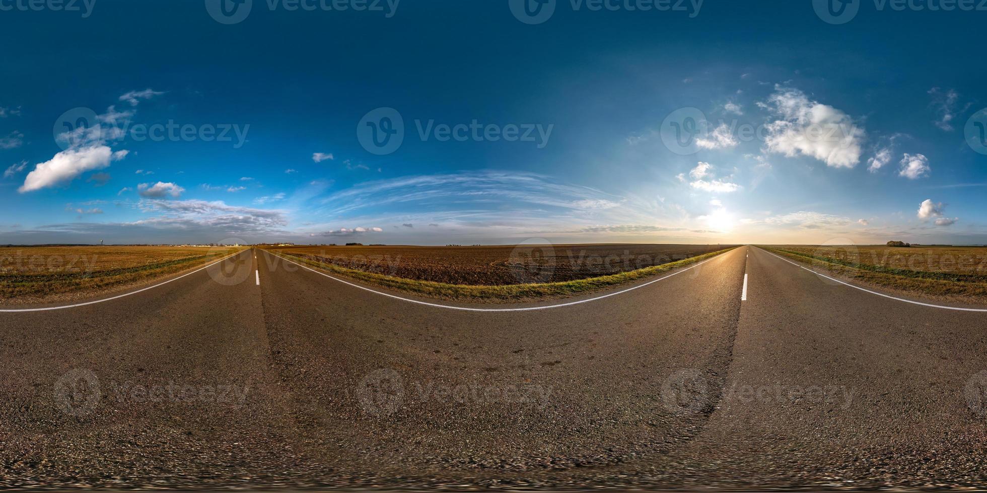 full seamless spherical hdri panorama 360 degrees angle view on ashault road among fields in autumn evening with beautiful clouds in equirectangular projection, ready for VR AR virtual reality content photo