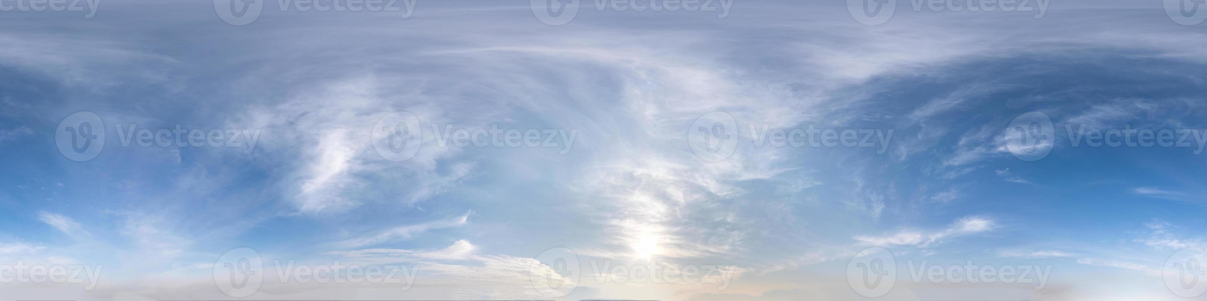 Seamless hdri panorama 360 degrees angle view blue sky with beautiful fluffy cumulus clouds with zenith for use in 3d graphics or game development as sky dome or edit drone shot photo