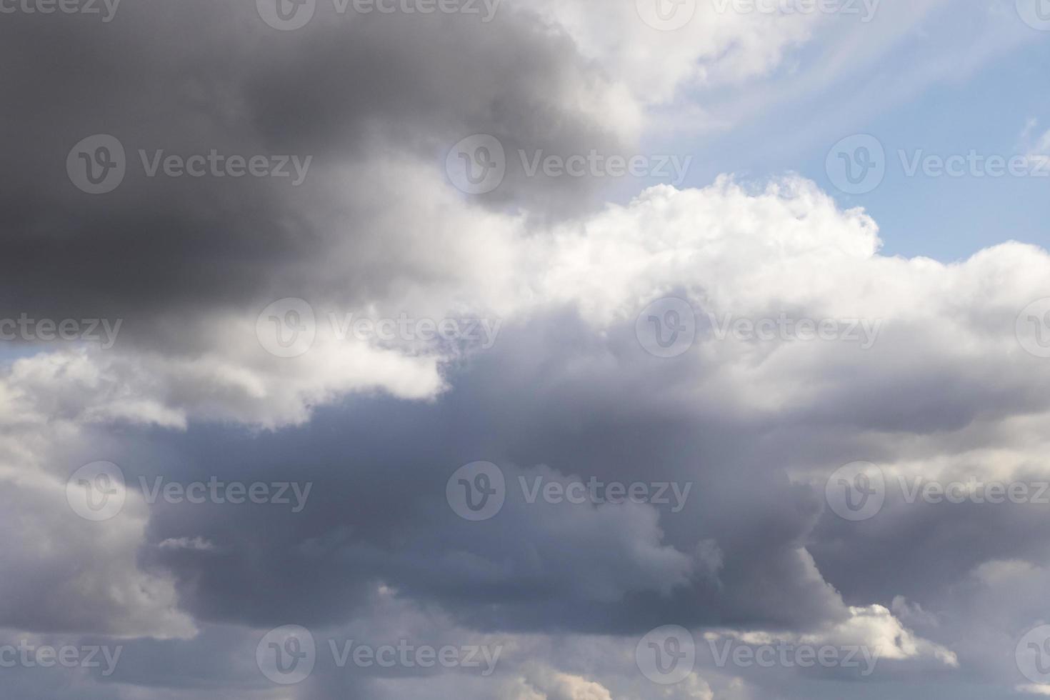 Blue sky background with tiny stratus cirrus striped clouds. Clearing day and Good windy weather photo