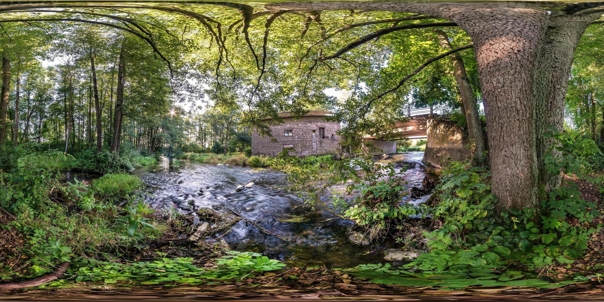 full seamless spherical hdri panorama 360  degrees angle view near abandoned water mill narrow fast river in sunny morning in equirectangular projection with zenith and nadir. VR AR content photo