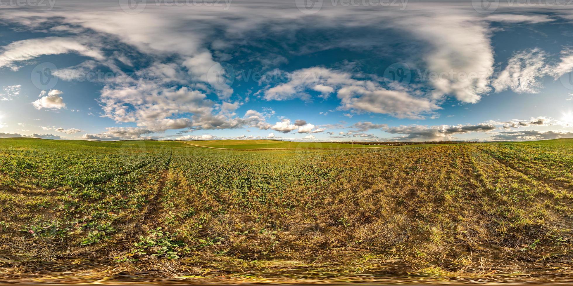 full seamless spherical hdri panorama 360 degrees angle view among fields in autumn sunny day with awesome clouds in equirectangular projection with zenith and nadir, ready for VR AR virtual reality photo
