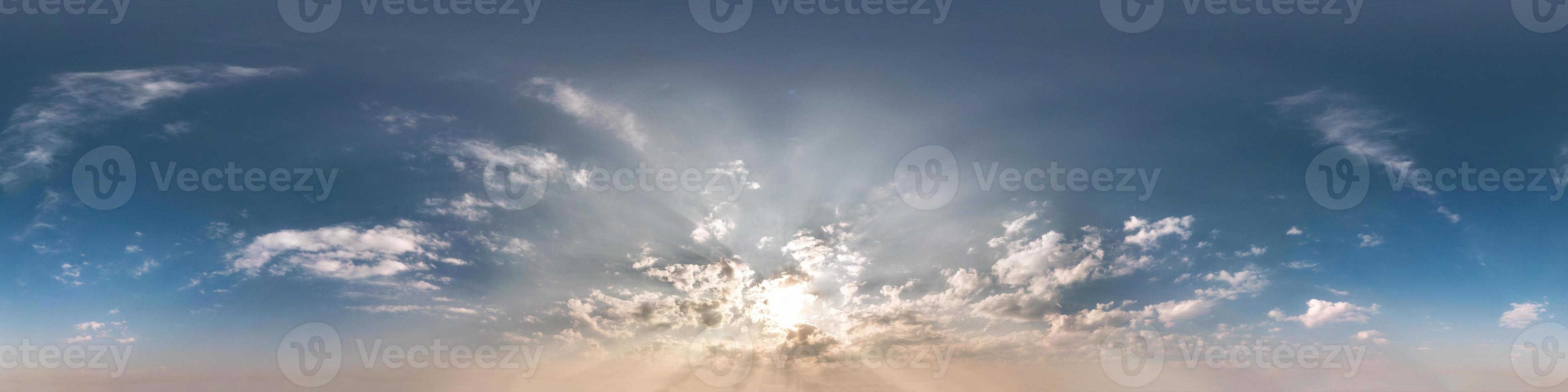 Seamless cloudy blue sky before sunset hdri panorama 360 degrees angle view with zenith and beautiful clouds for use in 3d graphics as sky dome or edit drone shot photo