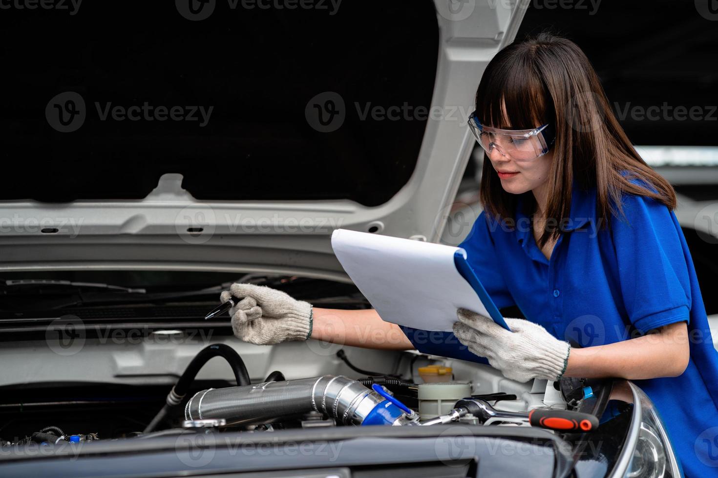 The concept of automobile repair, automobile maintenance service and maintenance. Vehicle inspection photo