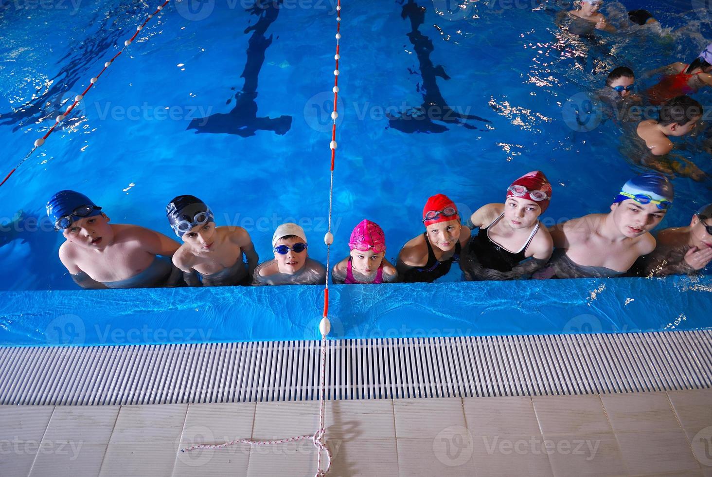 .childrens in serie at swimming pool photo