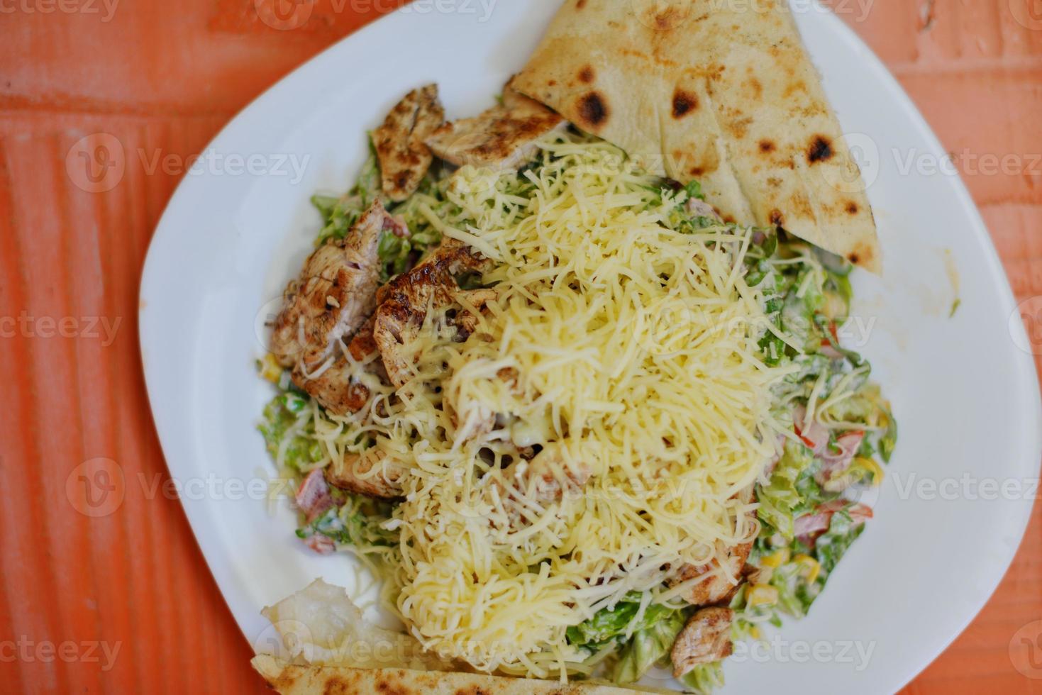 woman eat salad photo