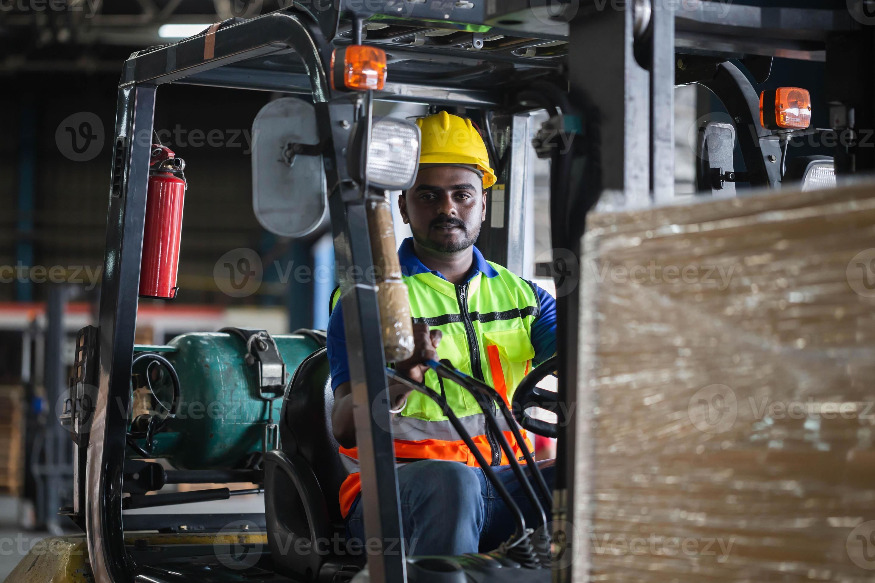 Worker on forklift, Manual workers working in warehouse, Worker driver