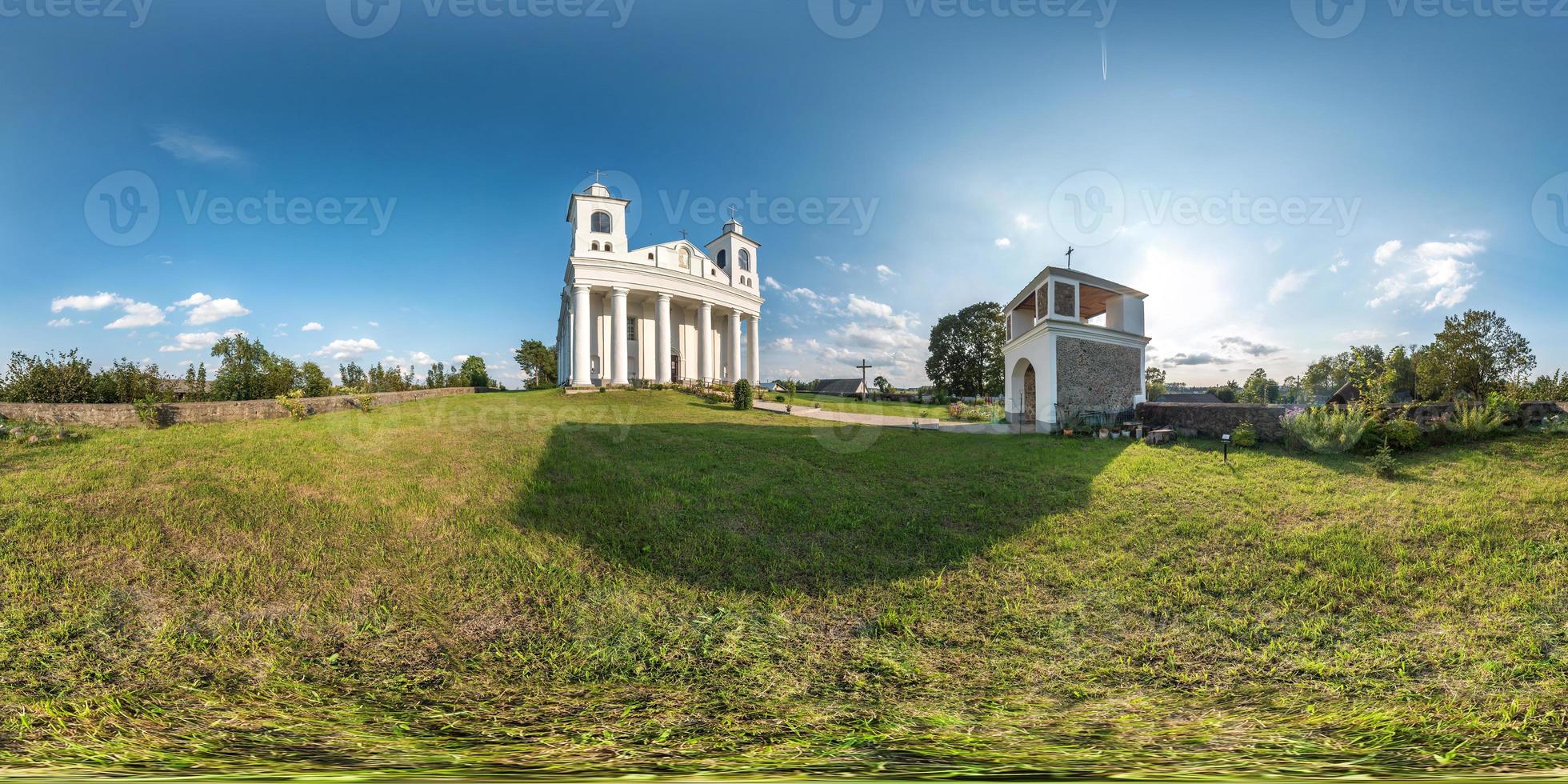 Full seamless spherical hdri panorama 360 degrees angle in small village with decorative medieval style architecture church in equirectangular spherical projection with zenith and nadir. vr content photo