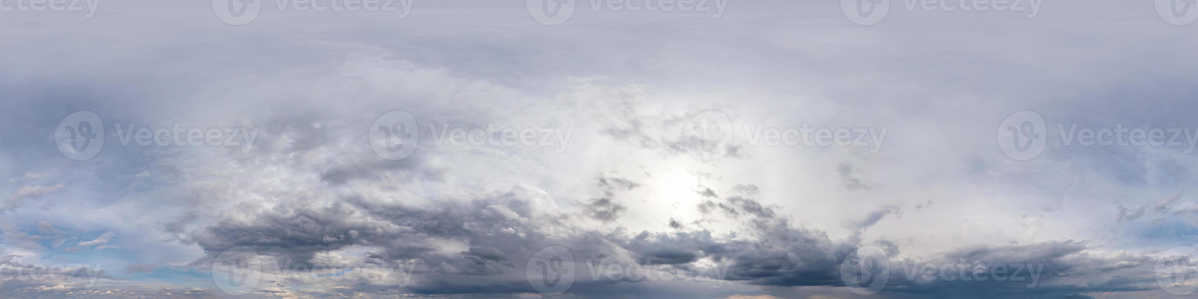 blue sky with beautiful fluffy cumulus clouds. Seamless hdri panorama 360 degrees angle view without ground for use in 3d graphics or game development as sky dome or edit drone shot photo