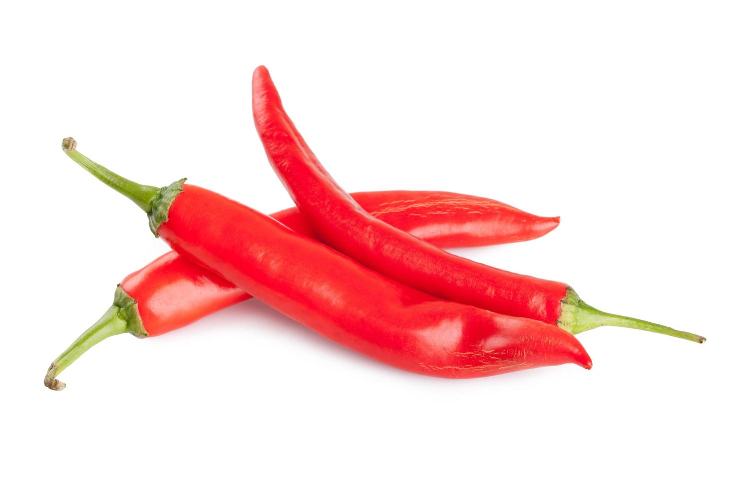 red chili or chilli cayenne pepper isolated on white background photo