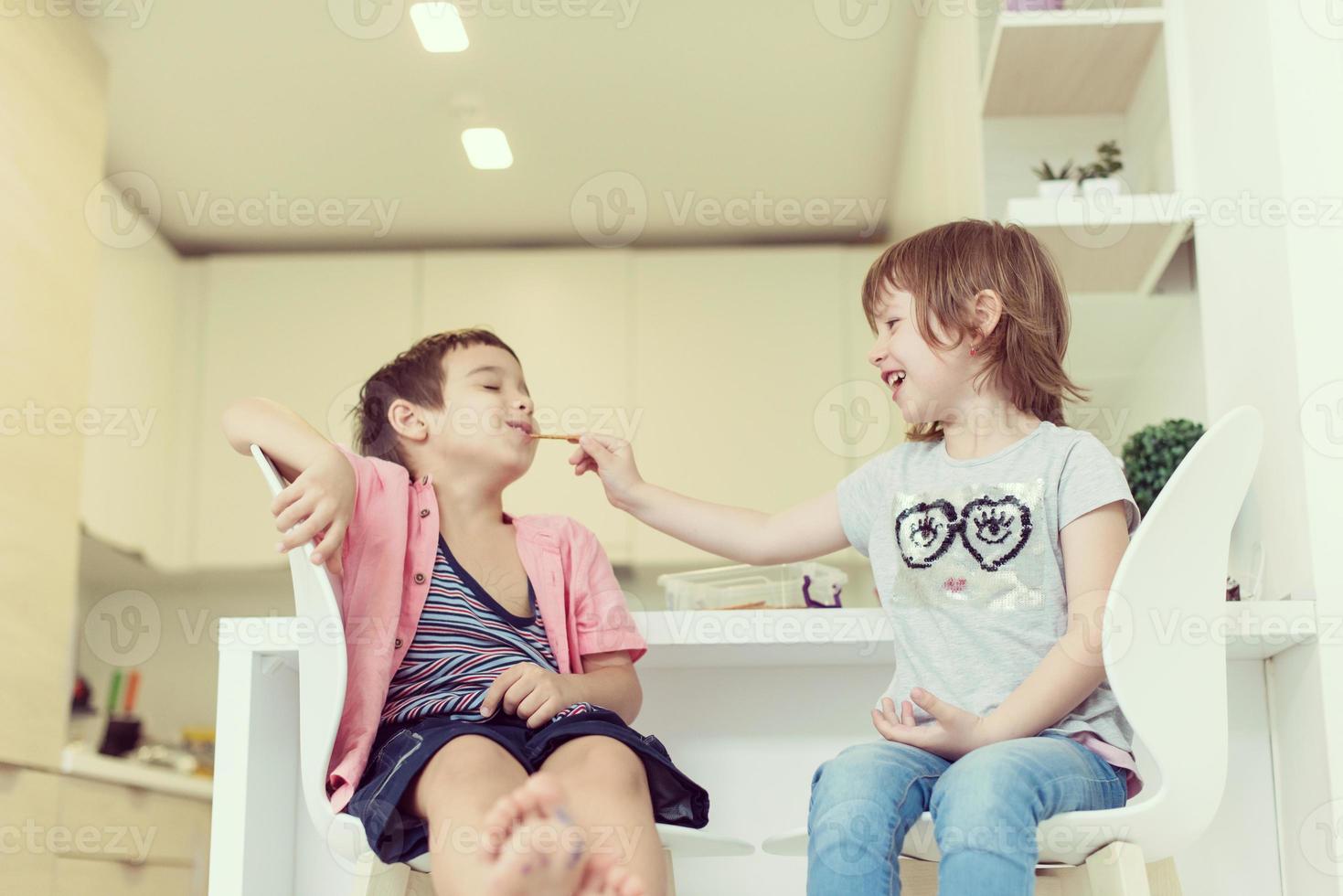 cute little brother and sister at home photo