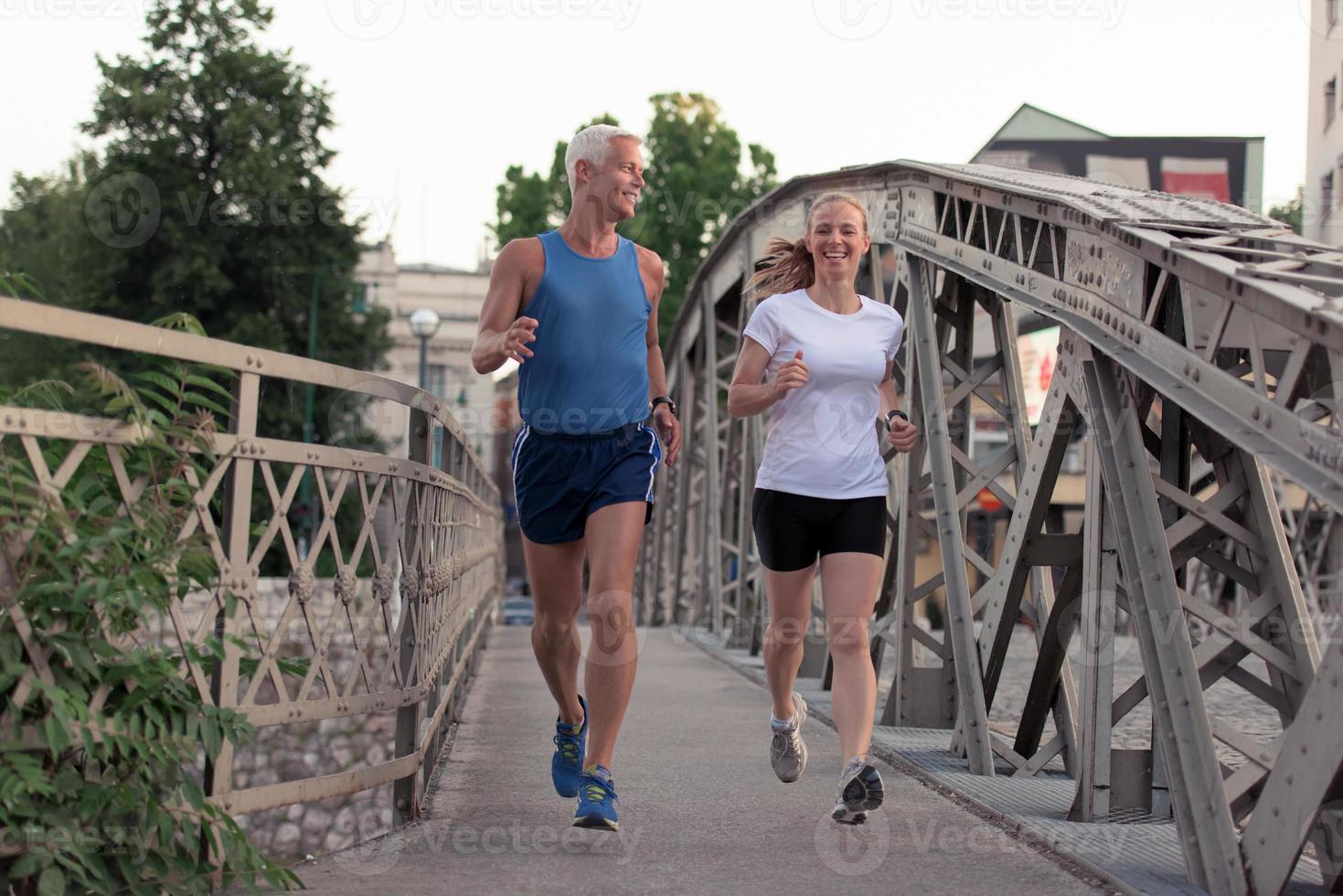 Couple jogging outside photo