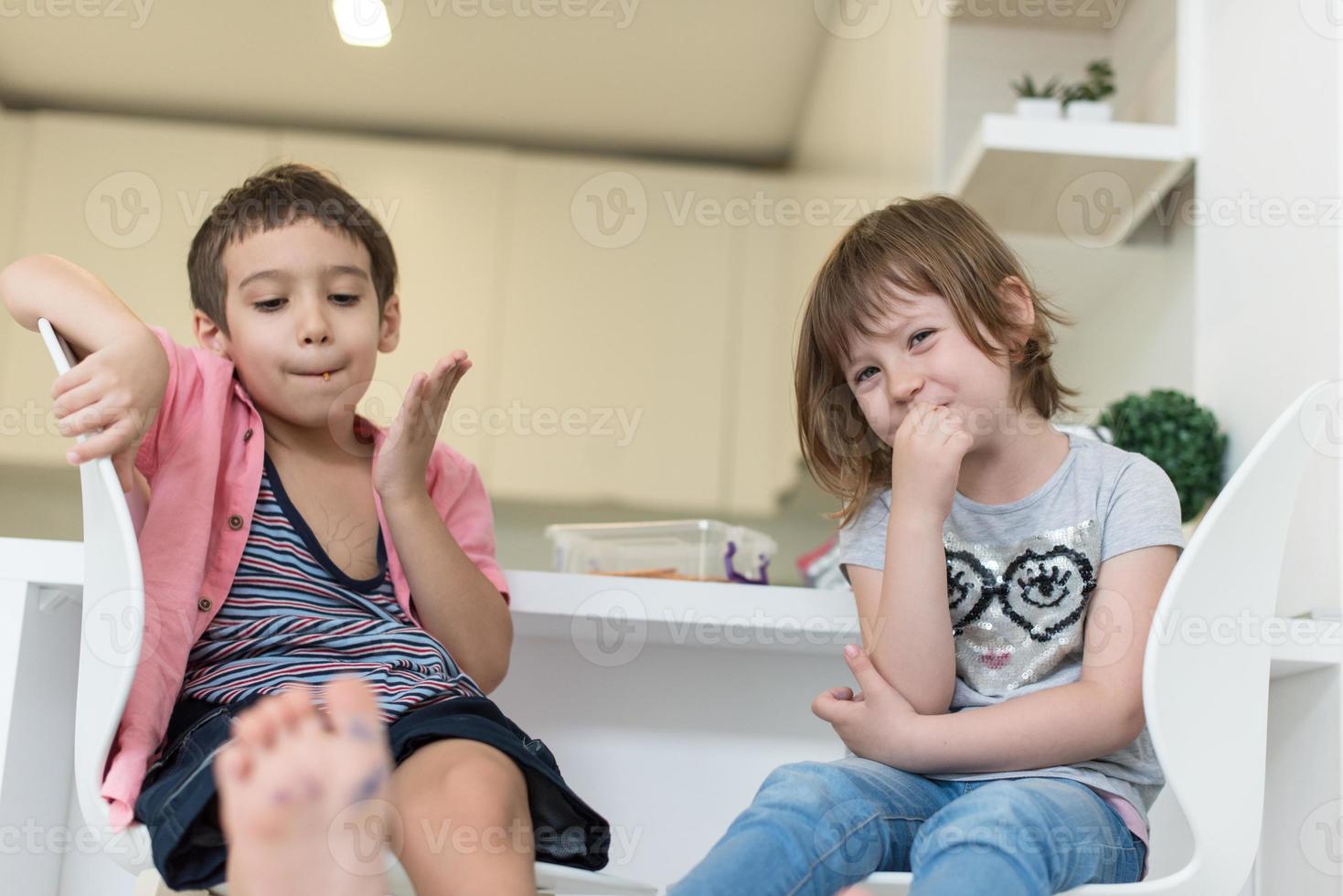 cute little brother and sister at home photo
