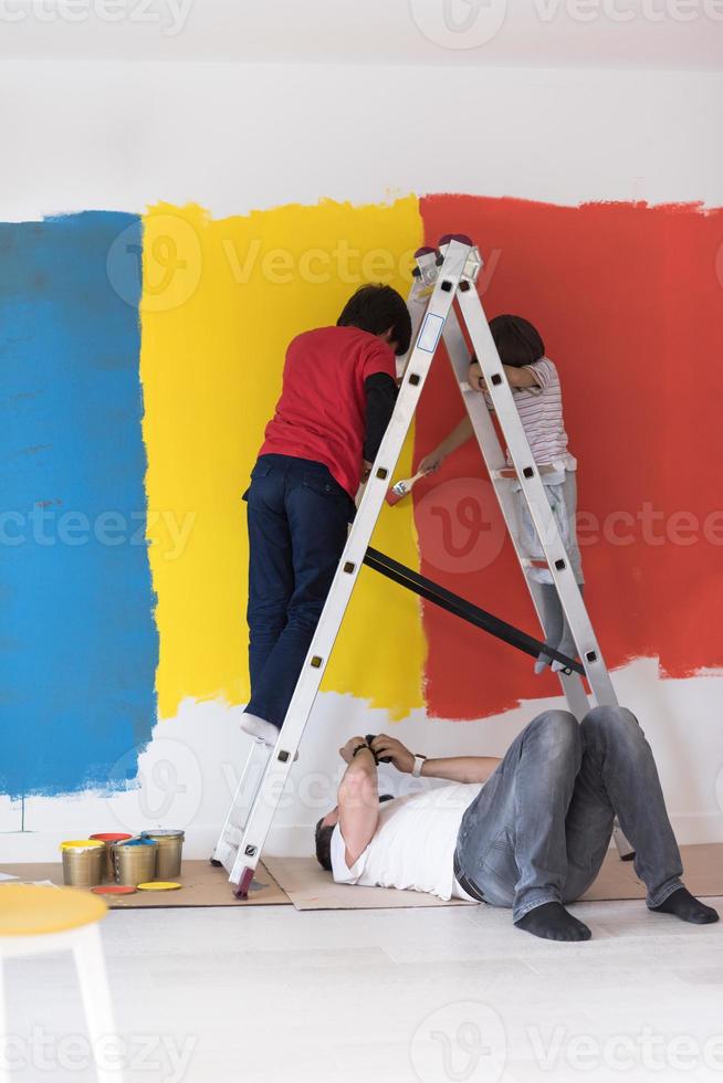 boys painting wall photo