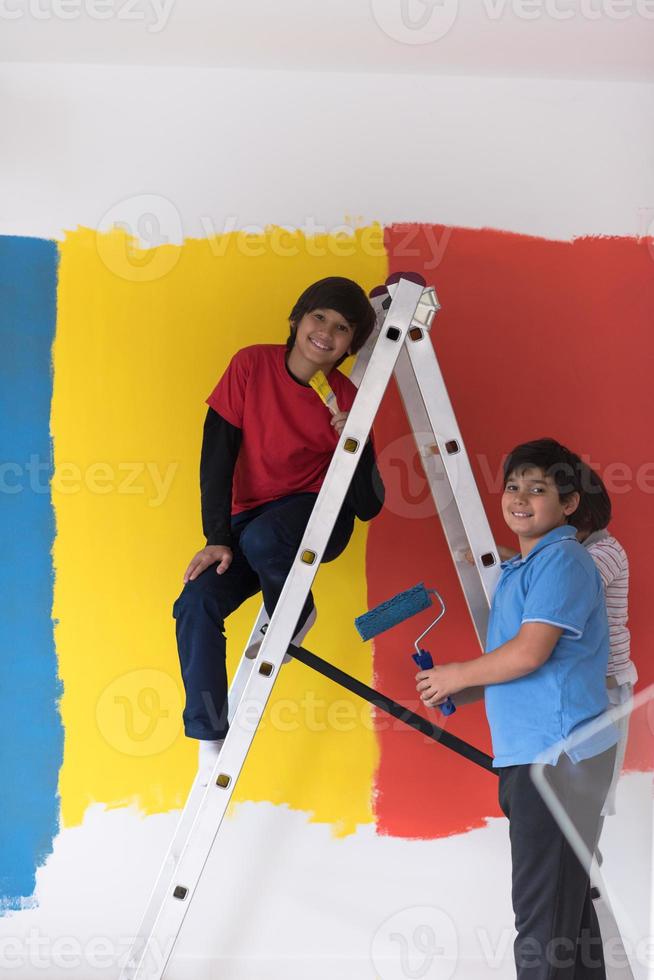 boys painting wall photo