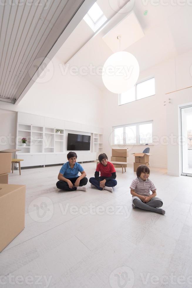 young boys having fun on the floor photo