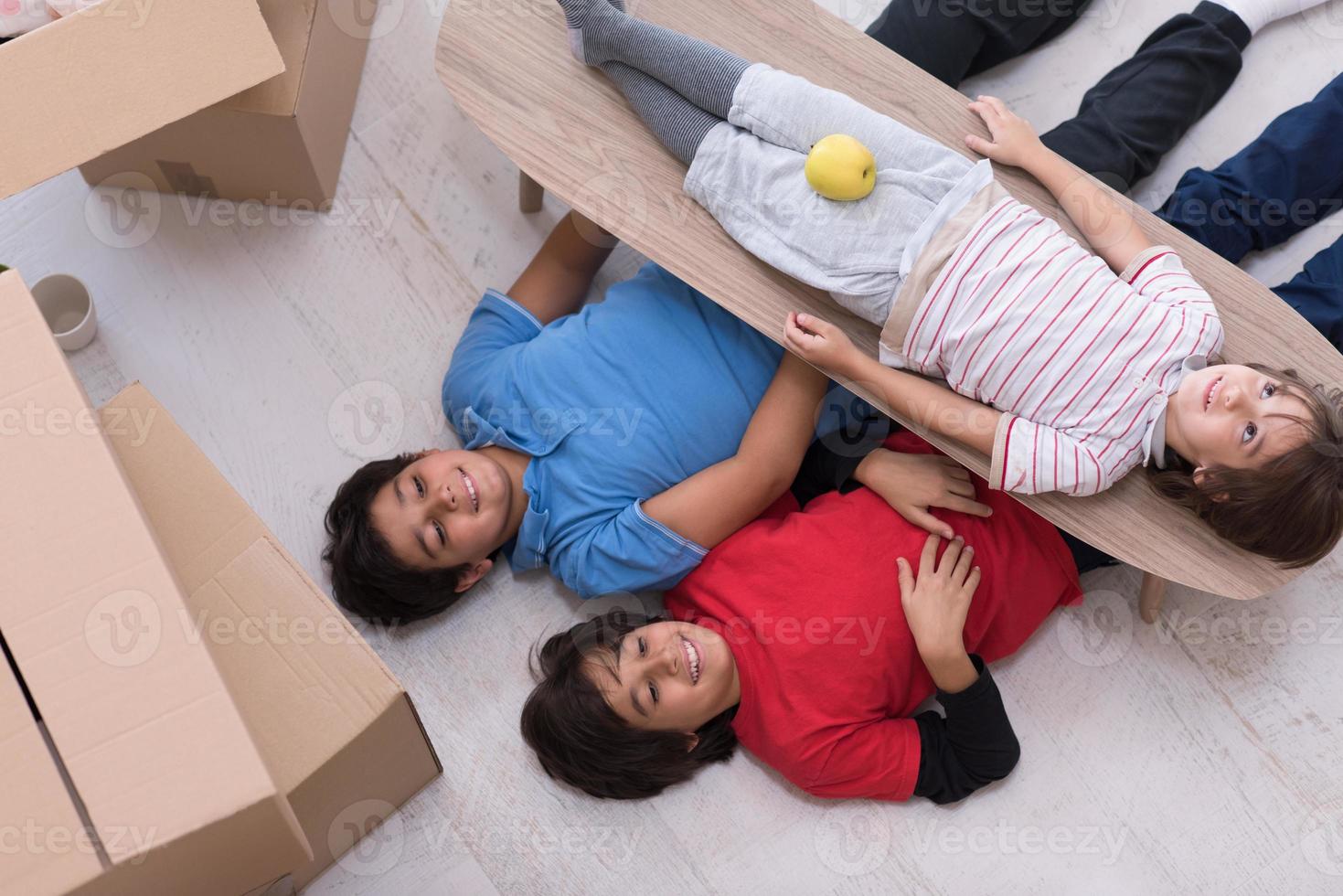 boys with cardboard boxes around them top view photo