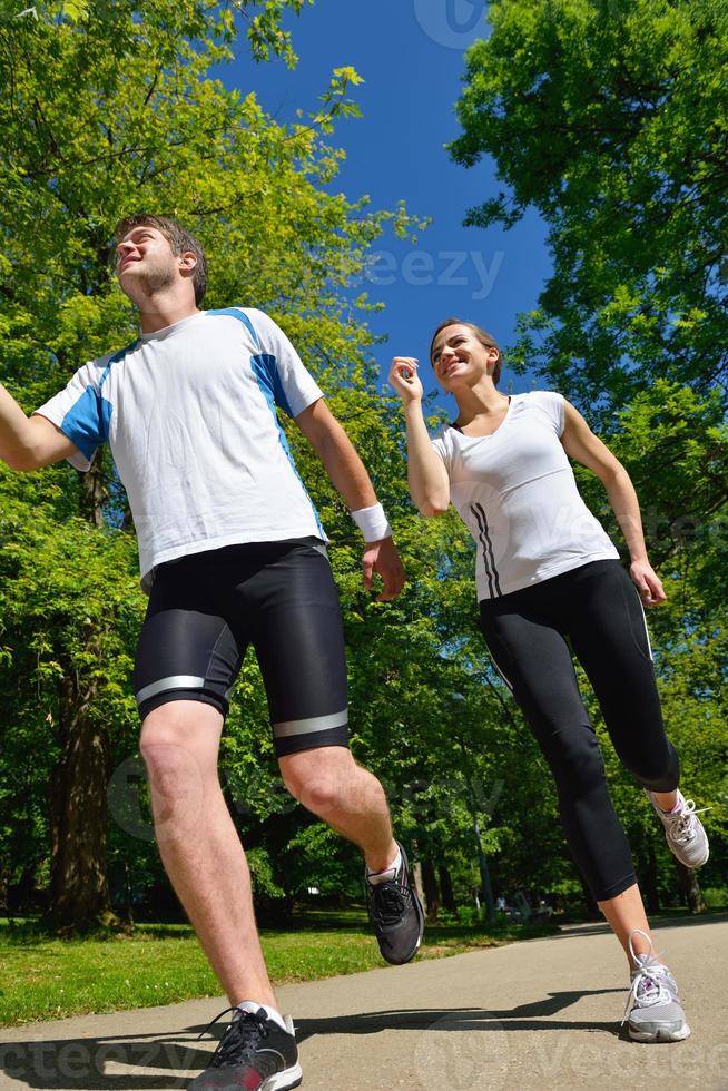 Young couple jogging photo