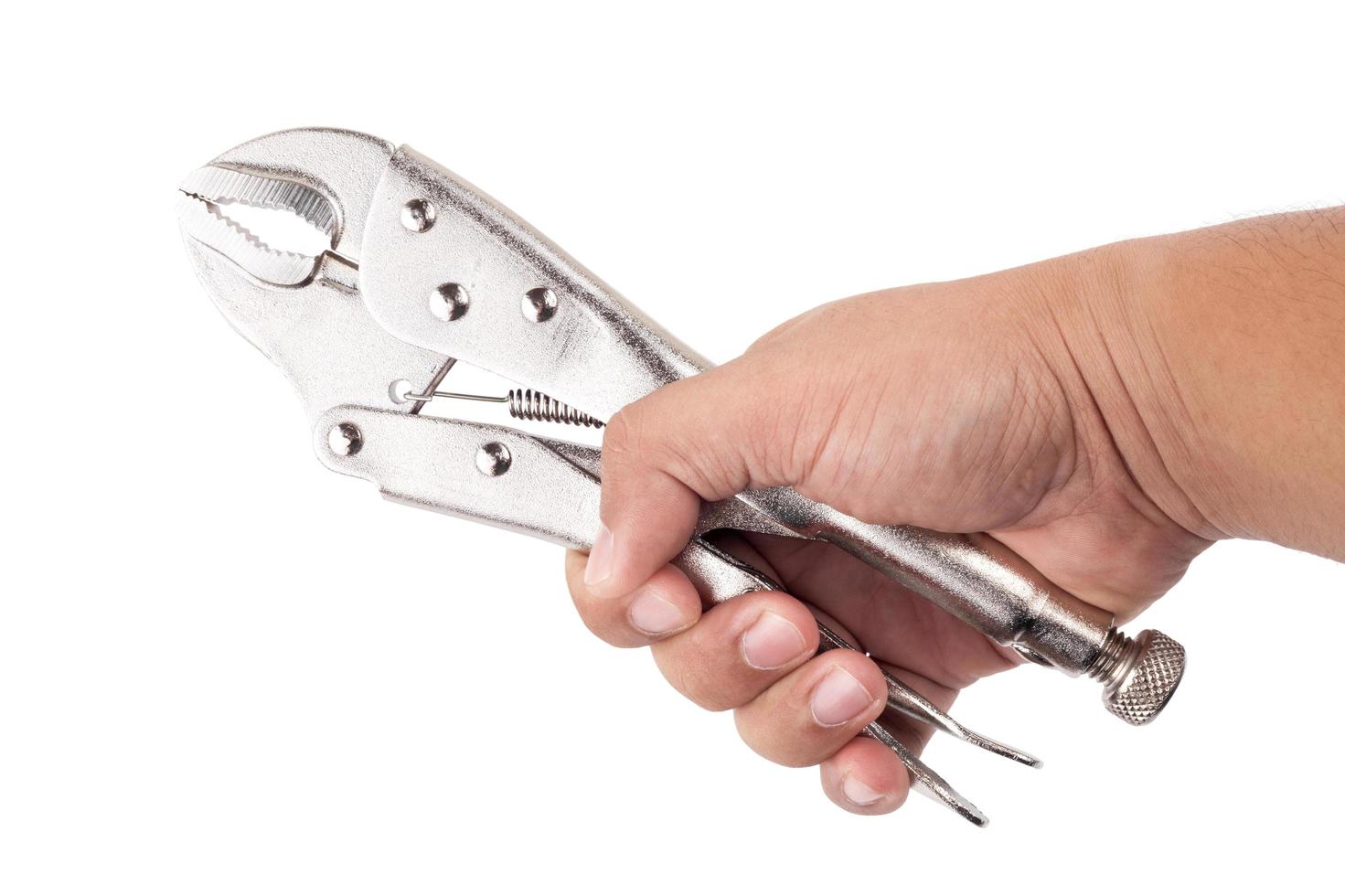 hand holding locking grip pliers on white background photo