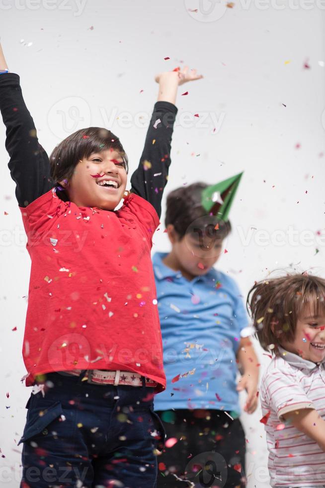 kids  blowing confetti photo