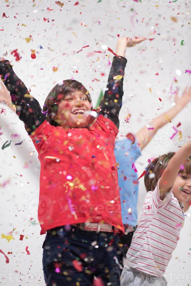 kids  blowing confetti photo