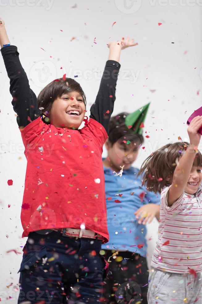 kids  blowing confetti photo