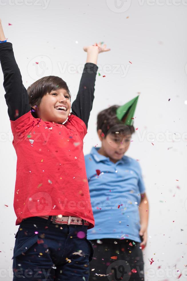 kids  blowing confetti photo