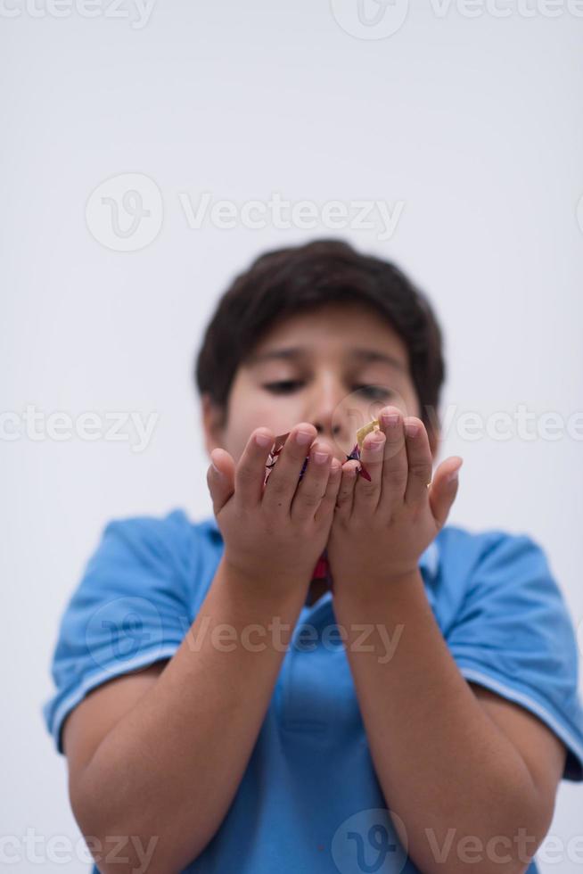 kid blowing confetti photo