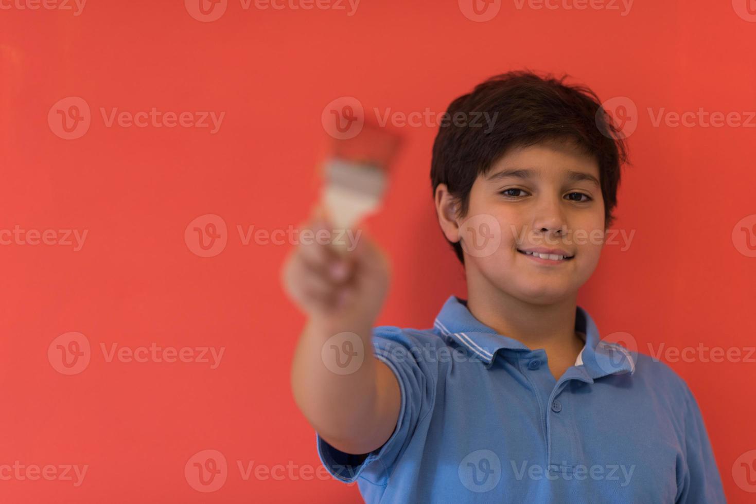 Portrait of a happy young boy painter photo