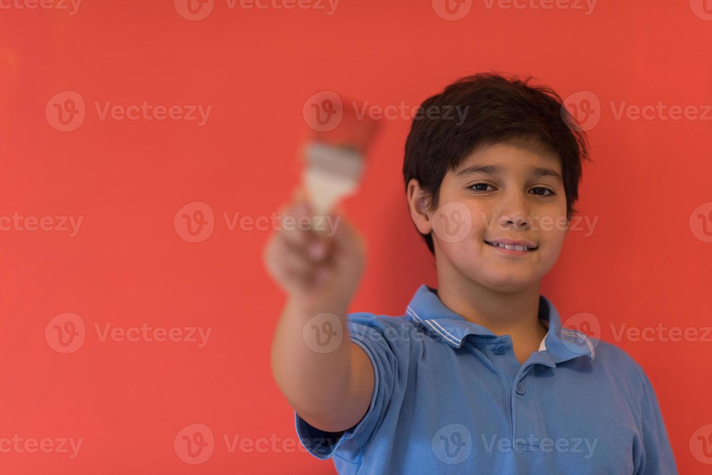 Portrait of a happy young boy painter photo