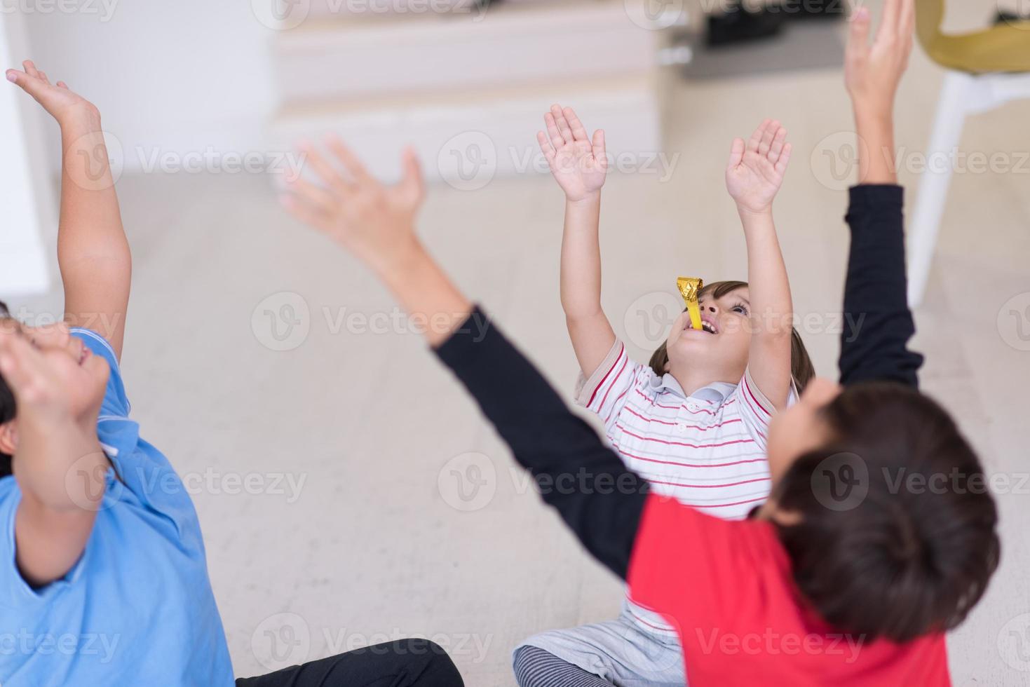 young boys having fun on the floor photo