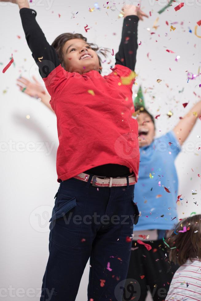 kids  blowing confetti photo