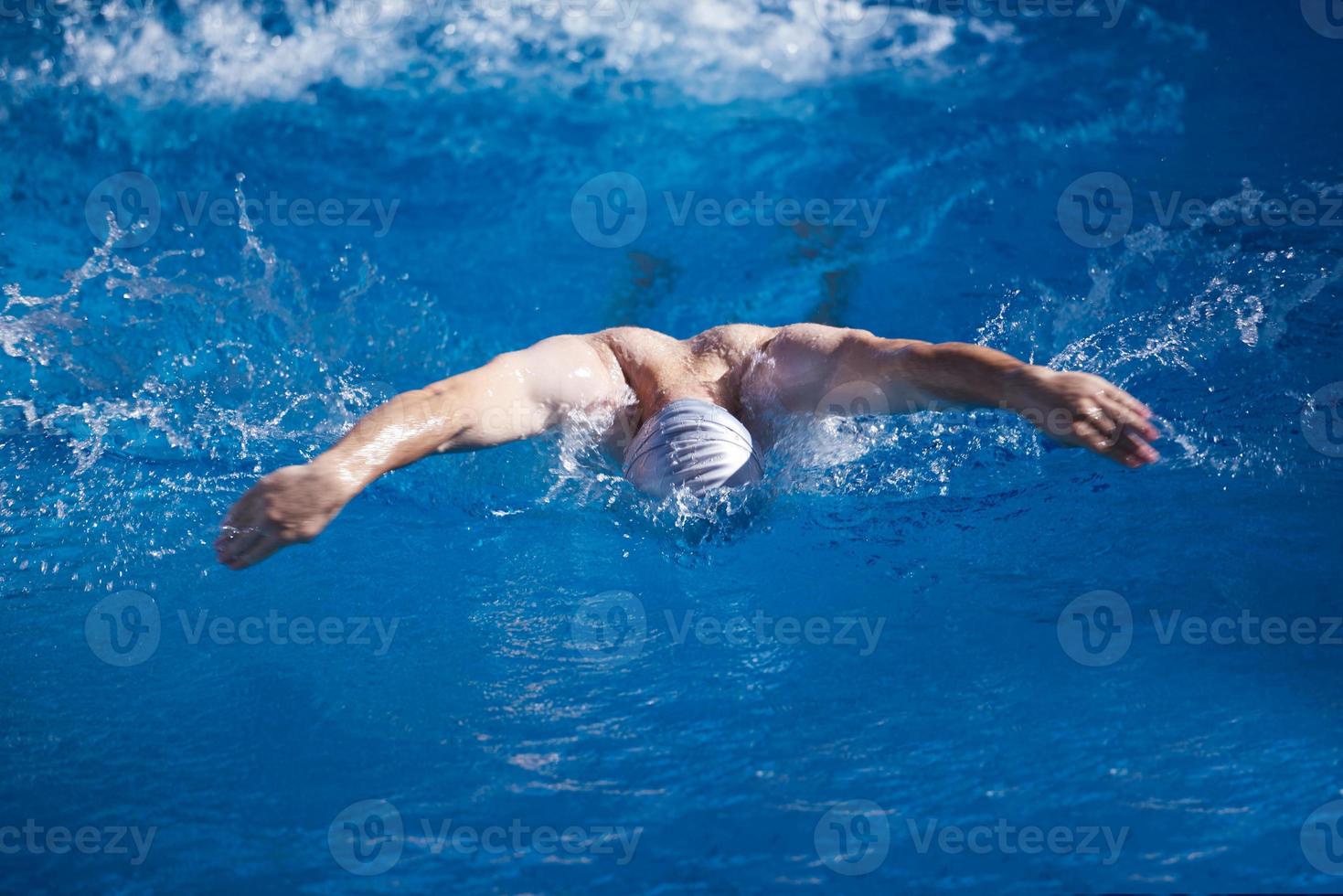 swimmer excercise on indoor swimming poo photo