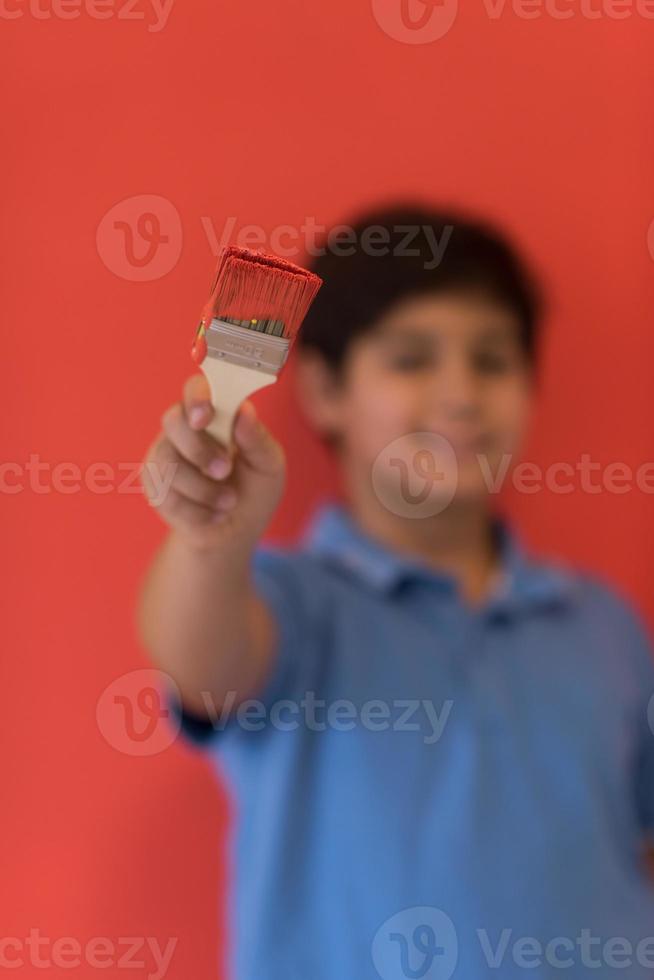 Portrait of a happy young boy painter photo