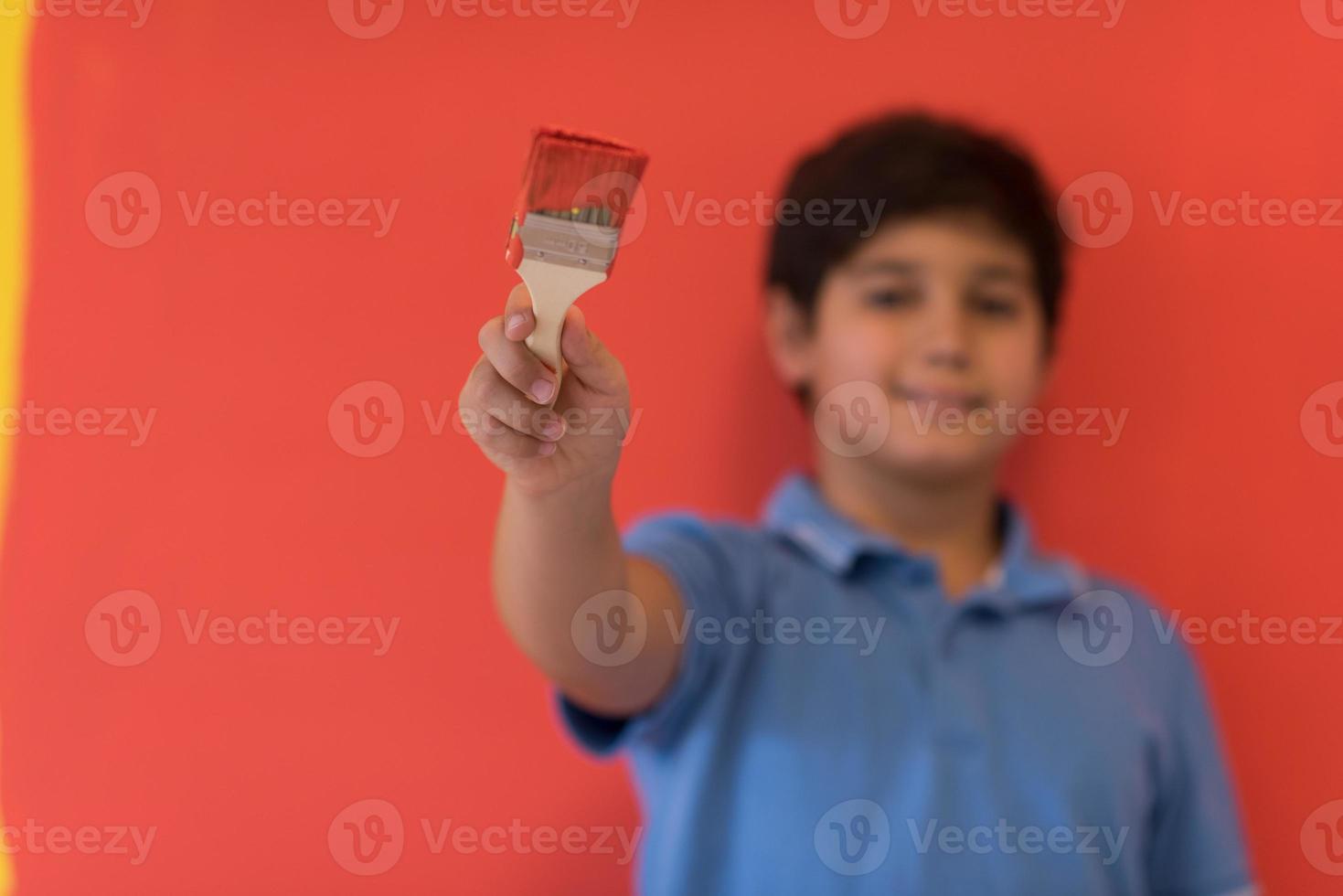 Portrait of a happy young boy painter photo